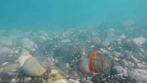 An-Empty-Plastic-Bottle-Floats-In-Seawater-Contamination-Of-The-Sea-With-Waste-Is-A-Bad-Ecology-Conc