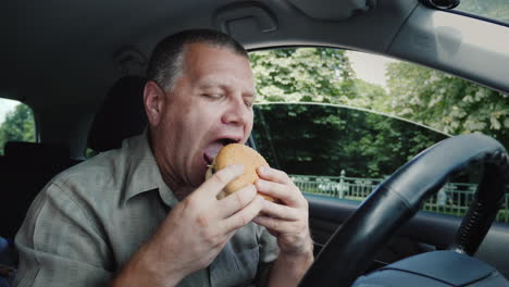 The-Driver-Eats-Fast-Food-Inside-The-Car