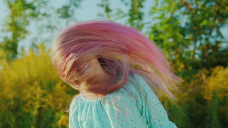 Cool-Girl-Playing-With-Her-Pink-Long-Hair