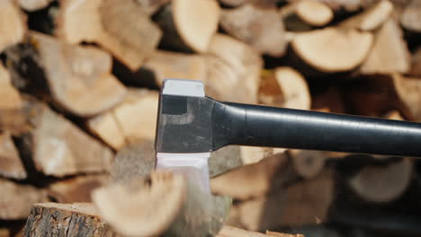 A-Modern-Ax-Splits-A-Log-Harvesting-Firewood-For-The-Winter