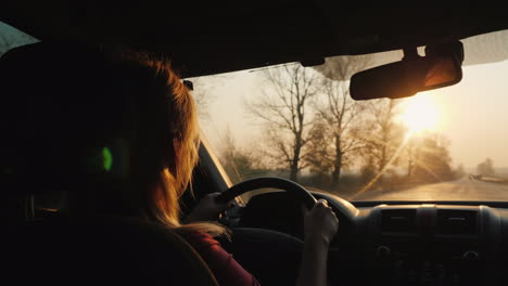 Silhouette-Of-A-Female-Driver-Driving-A-Car