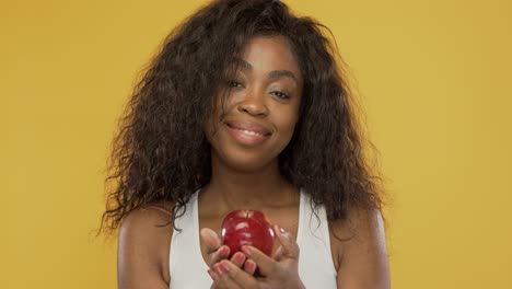 Positive-female-sharing-apple-with-camera
