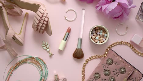 Beauty-and-fashion-accessories-and-gadgets--Femine-concept--Flat-lay-on-pink-theme-background
