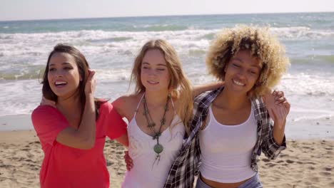 Three-happy-vivacious-multiracial-girl-friends