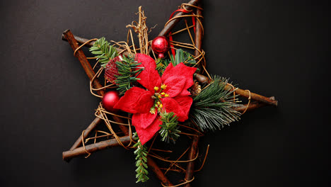 Christmas-wreath-with-dry-twigs--pine-branches--red-balls