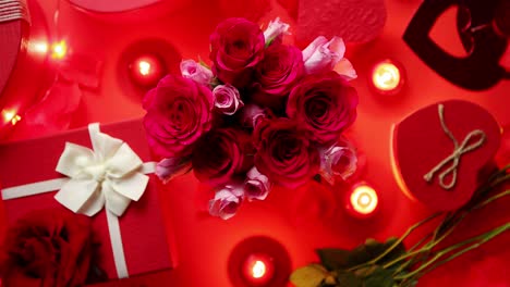 Valentines-day-romantic-decoration-with-roses--boxed-gifts--candles