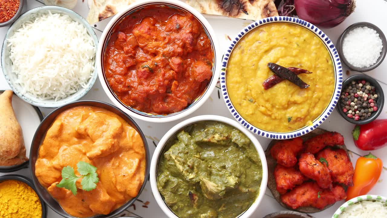Premium stock video - Assorted indian various food with spices rice and ...
