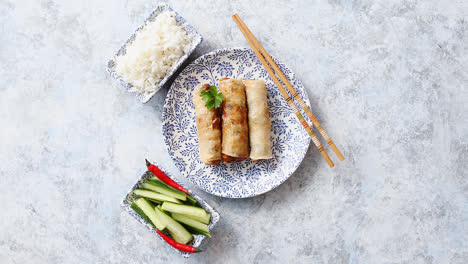 Orginal-asian-deep-fried-spring-rolls-placed-on-beautiful-oriental-style-plate
