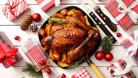 Roasted-whole-chicken-or-turkey-served-in-iron-pan-with-Christmas-decoration