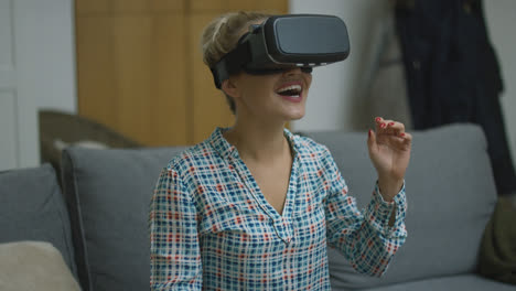 Cheerful-woman-in-VR-headset