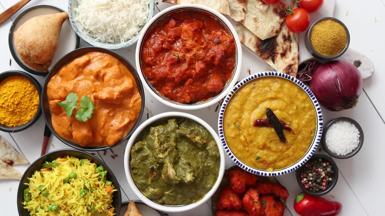 Premium stock video - Assorted indian various food with spices rice and ...