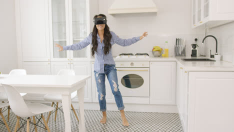 Female-enjoying-VR-headset-at-home